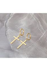 Dangle cross gold earrings